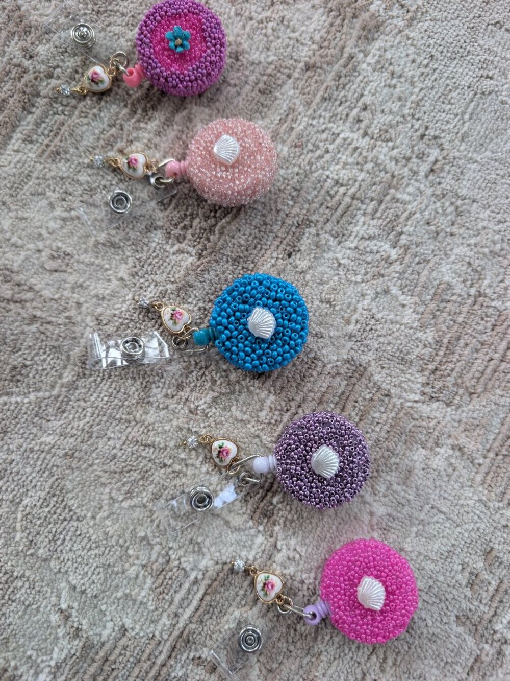 Hand-beaded Badge Reels